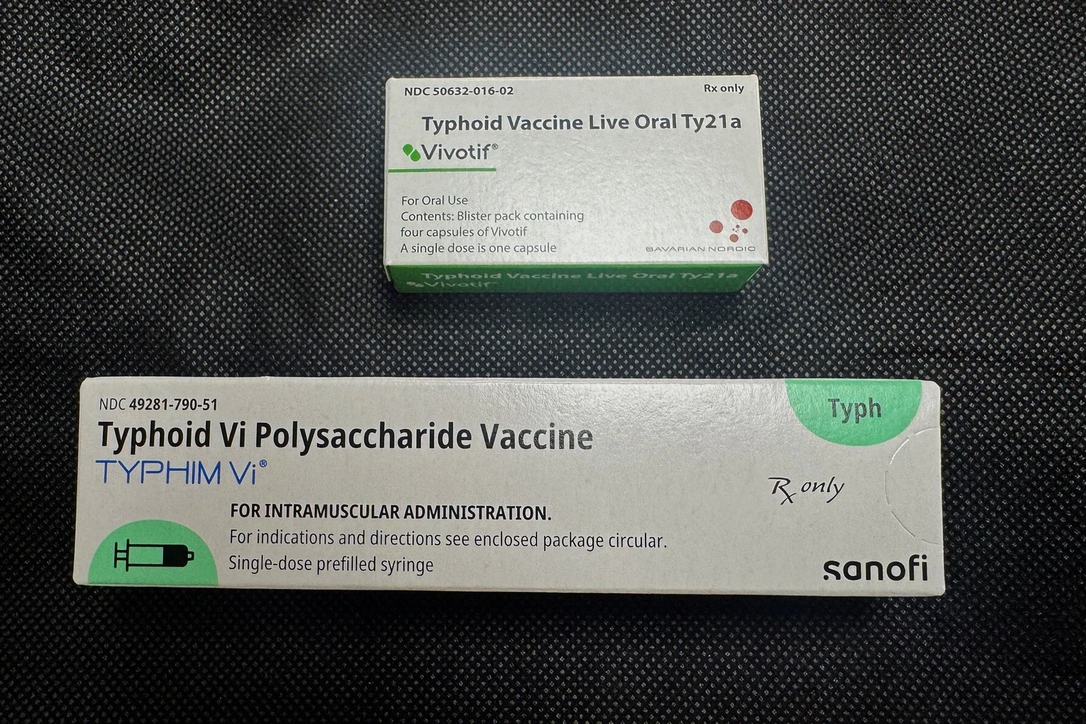 Vivotif oral typhoid vaccine box and Typhim Vi injectable typhoid vaccine box side by side